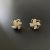 Joyería de molino de viento giratorio 2021 nuevos accesorios para pendientes circón Explosiones de celebridades de internet pendientes giratorios cuentas de transferencia al por mayor