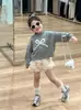 Primavera 2026 Nuevo Estilo Coreano Ropa Infantil Niñas Bordado de Toalla Lazo Suéter Corto de Punto Dulce Suave