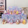 Nueva Bola de Cristal Park Giratoria Caja Sorpresa Dibujo Animado Mascota Linda Mini Adorno de Bola de Cristal Muñeca Linda Adorno de Caja Sorpresa