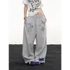 Pantalones de chándal estampados patchwork retro americano 2026 para hombre y mujer, corte ajustado hip-hop deportivo casual para pareja, pantalones de pierna ancha de moda