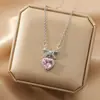 2025 Nuevo Collar de Zirconia Rosa con Lazo Estilo Bosque Nicho Colgante de Corazón Cadena para Clavícula de Acero de Titanio