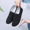 Zapatos de lona para mujer, antideslizantes, cómodos, ligeros, transpirables, de suela suave, combinables, de caña baja, nuevos zapatos de trabajo de tela negros de fábrica para hombres y mujeres.