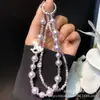 Caja Misteriosa Cadena para Teléfono Móvil Aleación Unicornio Perla Cadena Doble Carrusel Cadena Colgante Nueva Cadena con Cuentas de Cristal Venta al por Mayor