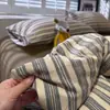 Juego de cuatro piezas a rayas de algodón puro Clase A para maternidad e infantil, sábana bajera de algodón puro simple transfronteriza, sábana bajera ajustable, funda de edredón, juego de tres piezas para dormitorio de estudiantes 4