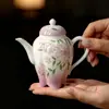 Tetera de cerámica estilo chino nuevo con flor de hibisco pintada a mano Mojie, juego de té kung fu, para uso doméstico, tetera con filtro de bola, tetera individual