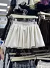 Falda corta de línea A floral anti-exposición de nuevo estilo para primavera y otoño 2026 para mujeres petite, falda midi entalladora de cintura alta
