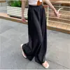 Calça de moletom feminina estilo coreano, minimalista, de cintura alta e perna reta, com cós largo, bolsos laterais, caimento fluido e solto, adequada para uso diário, fitness e ocasiões casuais