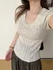 Top de punto para mujer estilo coreano, cuello en U, hueco, manga corta, nuevo modelo de verano 2026, corte ajustado, versátil, top de alta gama