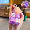Llavero Colgante Botón Sonoro Luminoso de Dibujos Animados Sanrio Hello Kitty Juguete de Descompresión Gato KT Adorno de Llavero