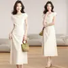 Elegante vestido color albaricoque sin hombros para mujer, nuevo estilo verano 2026, cintura ceñida, manga corta, vestido largo intelectual y sencillo
