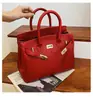 Estilo explosivo de moda transfronteiriça bolsa grande de mão feminina 2026 nova bolsa vermelha de casamento da moda bolsa tote transversal de grande capacidade