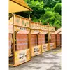 Construção de atividade de mercado exposição estrutura de bambu barraca de bambu galpão de bambu guarita de bambu estande produção instalação vara de bambu haste