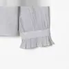 Comercio Exterior Transfronterizo Ropa de Mujer Primavera 2026 Estilo Europeo y Americano Camisa Rayada con Cuello Alto Volantes y Cordones para Mujer E490410