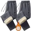 Pantalones casuales gruesos con forro de polar para otoño e invierno de hombre, pantalones de lana de cordero, pantalones deportivos de corte holgado, pantalones rectos de algodón cálido