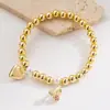 2025 Nuevo Estilo Ins Europeo y Americano Transfronterizo Pulsera de Cobre con Perlas de Corazón de Cereza Oro de 18 Quilates Elegante Versátil Accesorios para la Mano