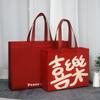 Bolsa de regalo roja Huanxi, no tejida, recubierta de película, para Año Nuevo, para compras en tiendas de ropa.