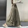Elegante saia plissada de cintura alta estilo retrô para mulheres, novo estilo para o início do outono de 2026, saia plissada de corte A que afina a silhueta e é estilosa, com barra larga