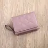Fornecimento transfronteiriço direto da fábrica Carteira feminina doce estilo coreano, bolsa de mão curta com zíper, porta-moedas e porta-cartões simples de cor sólida