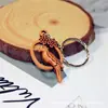 Venta caliente llavero imitación madera pequeño colgante de regalo creativo imitación madera ábaco bicicleta llavero práctico regalo
