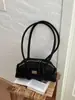 Bolso de mano de alta gama, versátil para mujer, nueva moda 2026, bolso de hombro exquisito, estilo coreano, bolso tipo bowling de nicho