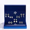 Set Semanal de Aretes con Aguja de Plata S925 con un Toque de Alta Gama, Aretes de Lazo de Lujo Ligero, Regalo de Cumpleaños para Niñas