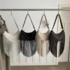 Bolso de Hombro Único Transfronterizo de Gran Capacidad Color Sólido 2026 PU con Borlas, Moda, Temperamento, Personalidad, Ambiente, para el Trabajo, Viajes, Debajo del Brazo