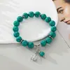 Pulseira com Pingente de Lótus Turquesa Natural Pulseira Colorida da Moda com Contas Elásticas Joia de Mão Feminina Venda Quente Transfronteiriça