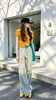 Conjunto Esportivo Casual Estilo Preguiçoso para Mulheres Verão Top Soltinho de Manga Curta Listrado Calça Longa de Pernas Largas Conjunto de Duas Peças