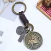 Llavero Unisex Versátil Creativo de los Doce Signos del Zodiaco con Patrón Personalizado Símbolos Colgante Decorativo de Doble Capa Accesorio