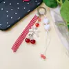Chaveiro de Xadrez Coração de Cereja Flor de Cereja Doce Estilo Ins Laço Charme de Bolsa Coração de Menina Lanyard para Celular