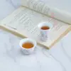 Yue Rui taza de té pequeña pintada a mano con polen de rosa taza de oreja única taza de tres patas taza de oreja taza de maestro alto valor de color