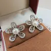 2026 Novos Brincos de Flor Estrela Pérola Renda Flor Oca de Cinco Pétalas Brincos de Zircônia Brincos de Moda Personalizados