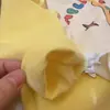 Camiseta de Manga Larga para Niños 2026 Primavera Nuevo Estilo Parche de Dibujos Animados Lindo Mangas Patchwork para Niños y Niñas Estilo Coreano Camiseta Base Moderna