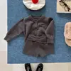 Conjunto de suéter estilo coreano para niñas Huzhou Zhili, atuendo de otoño con shorts y chaqueta cárdigan conjunto de dos piezas 7570