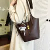 Bolso retro de moda para mujer 2026, moderno y minimalista, bolso de hombro de gran capacidad, de alta calidad y elegante, bolso simple para el antebrazo para mujer