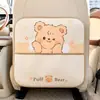 El protector de asiento Blue Rain anti-patadas, con un lindo diseño de oso, es un protector creativo y multifuncional para el respaldo del asiento del coche que previene la suciedad y las manchas
