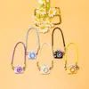 Novedoso y lindo modelo de colgante mini casa de muñecas caricatura cámara pequeña accesorio de collar de lazo accesorios para muñecas venta al por mayor