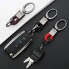 Chaveiro de carro de corda de couro trançado novo do fabricante, simples para homens, liga de zinco, padrão de pendurar na cintura, fivela de cabeça grande, cordão
