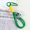 Nuevo Llavero de Mochila con Combinación de Colores Cordón Mosquetón Colgante de Muñeca Cadena para Teléfono Móvil Lanyard de Peluche Cuerda para la Muñeca
