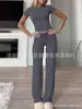 Comercio exterior transfronterizo Ropa europea y americana para mujer Primavera y verano 2024 Traje de moda de color liso con cuello redondo, temperamento urbano de ocio