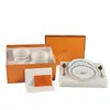 Venta Directa Transfronteriza Cadena de Hierro Azul Taza de Café y Platillo de Porcelana Fina Estilo Inglés, Juego de Regalo de Taza de Té de Cerámica Simple de Lujo Ligero para Regalar