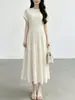 Vestido de alta gama para mujer Nanyou con una textura lujosa, estilo suave, cuello redondo, mangas cortas, elegante vestido de línea A, vestido Issey Miyake