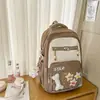 Nova Mochila Ins Estilo Japonês de Alto Valor Fresca Fofa com Múltiplos Bolsos para Dor Estudante Casual Simples de Grande Capacidade