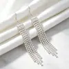 Aretes de clip para orejas sin perforación, estilo europeo y americano, con cadena de garra de diamantes completos y borla, para mujer, aretes de gancho para orejas de lujo ligero, ultra brillantes, de moda, para fiesta de bodas