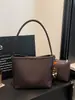 Bolso de cubo tejido a mano modelo 226 transfronterizo, bolso de hombro de moda de lujo ligero vintage de alto valor madre-hija para mujer