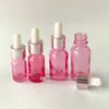 Frasco de óleo essencial ouro rosa atacado frasco de vidro pêssego conta-gotas de cabeça plástica 10ml30ml100ml pequeno frasco de amostra