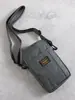 Mini Bolso para Teléfono Móvil de Hombre Lona Casual Bolso Pequeño de Hombro Moderno Versátil Portátil Bolso de Hombro para Herramientas de Moda Bolso Cruzado de Tendencia