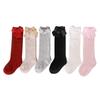 Calcetines de tubo con lazo para niña, calcetín coreano de algodón de color liso para bebé, venta al por mayor, otoño