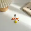 Estilo Nuevo Creativo Caramelo de Cereza Cuentas Redondas Grandes Perla Colorida Lazo Colgante de Bolso Cadena de Teléfono Accesorio