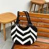Bolsa de Palha Vazada de Grande Capacidade para Comute de Verão para Mulheres 2025 Nova Bolsa de Praia Tecida Bolsa de Ombro Único para Sobrancelha